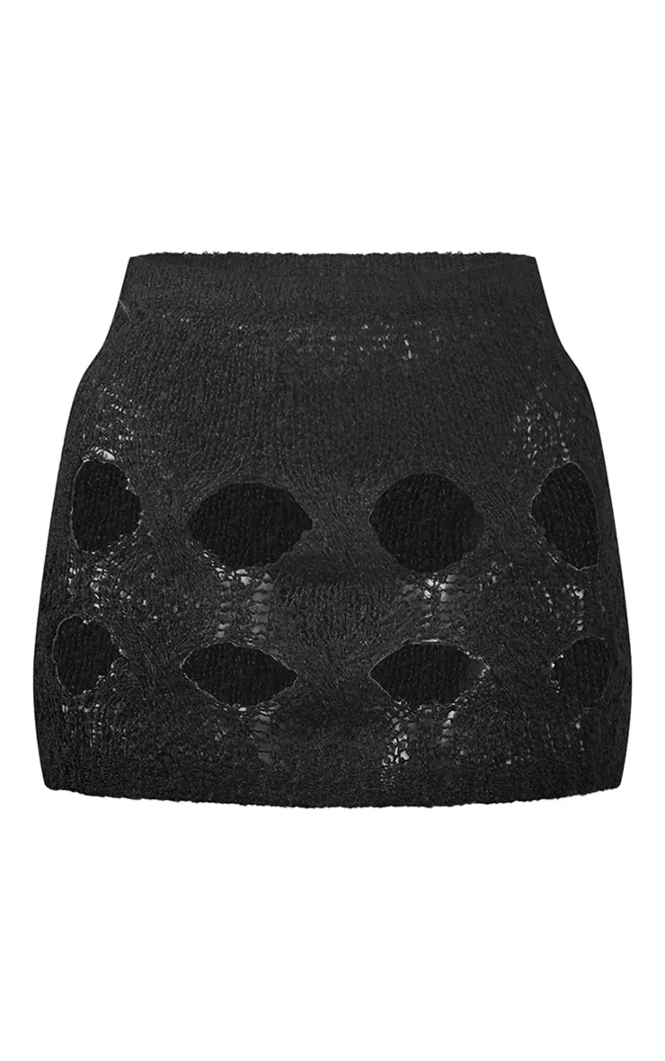 Mini-jupe en maille boucle noire